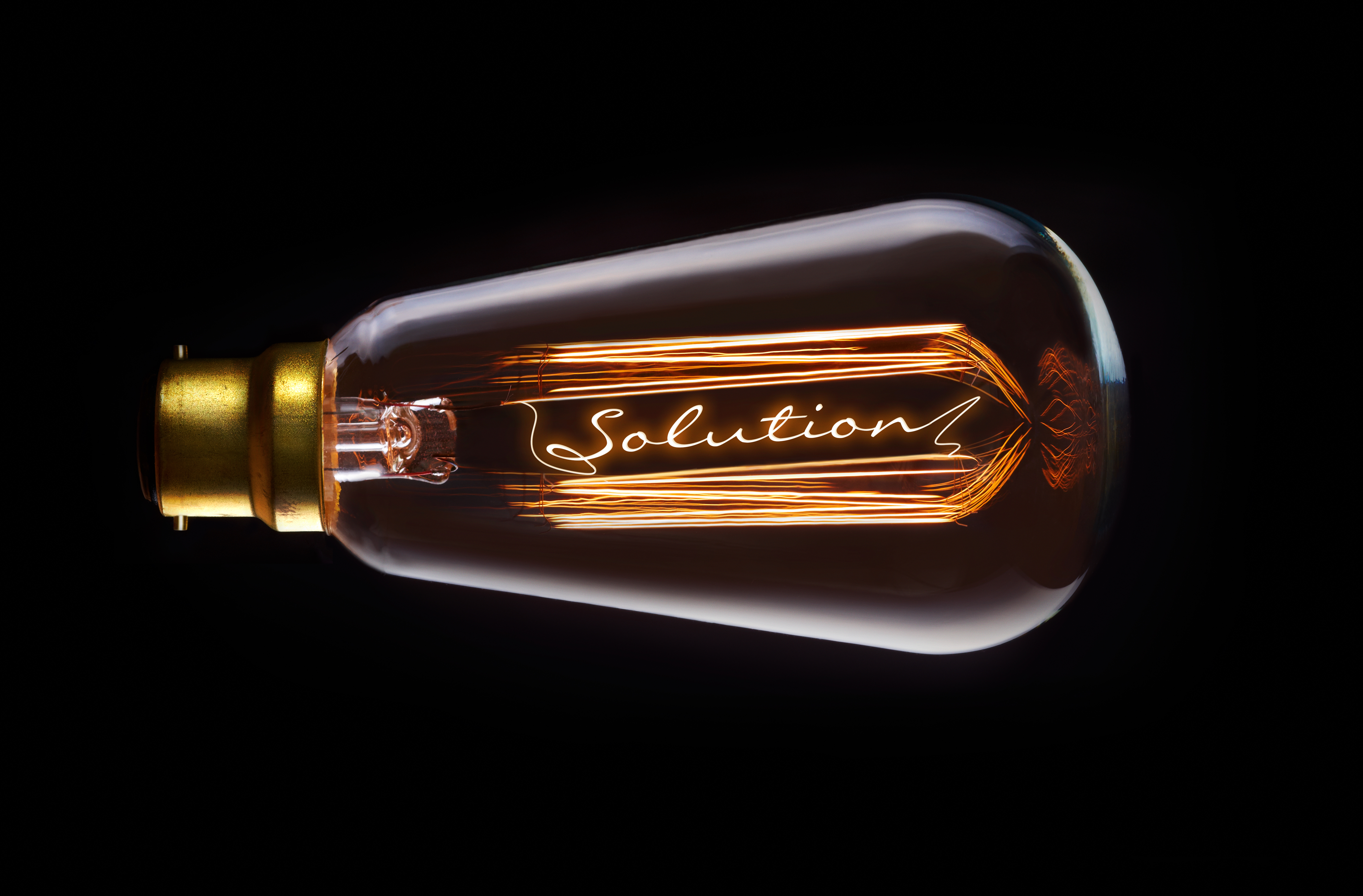 A light bulb with the word solution within it.